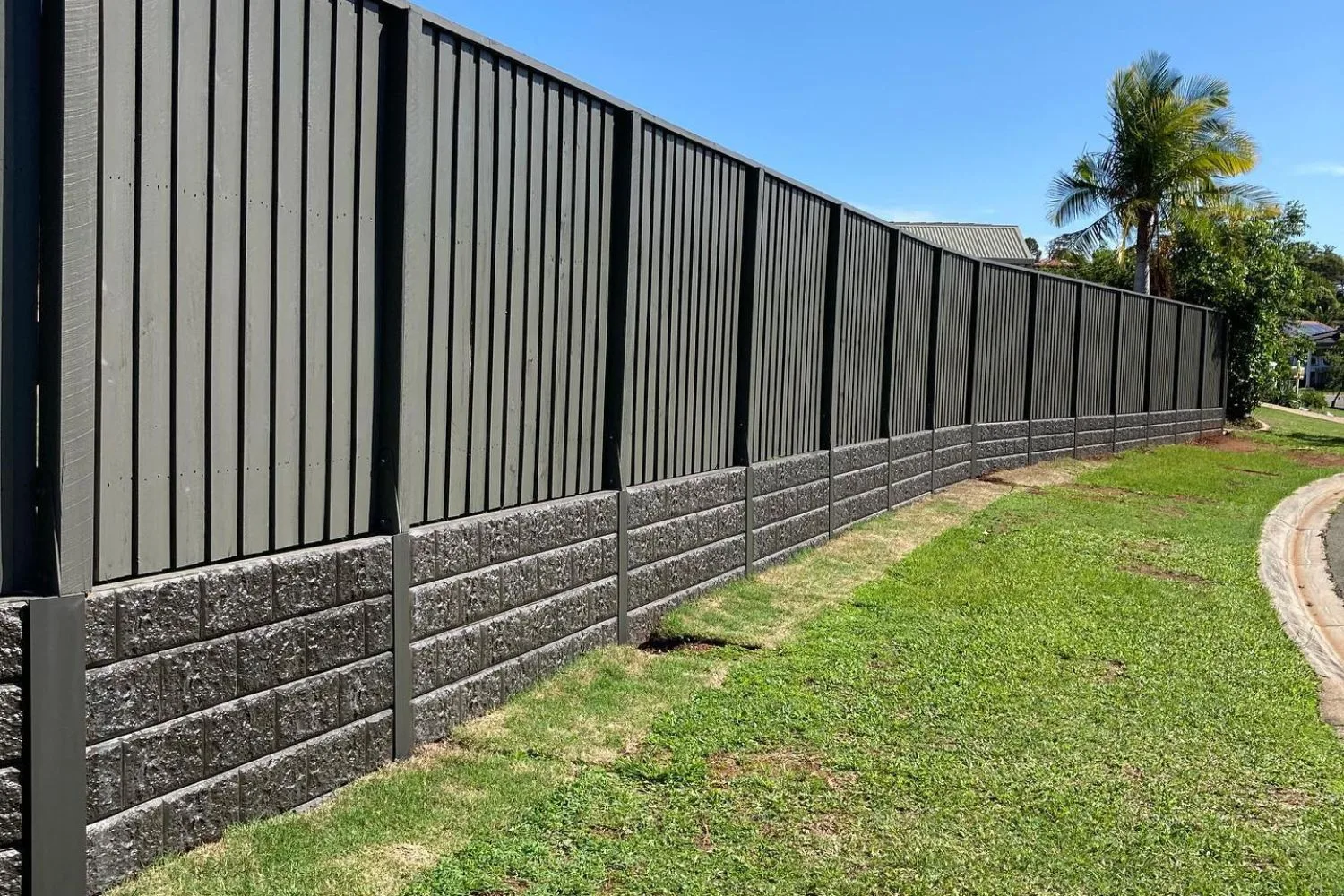 Concrete sleeper retaining wall construction